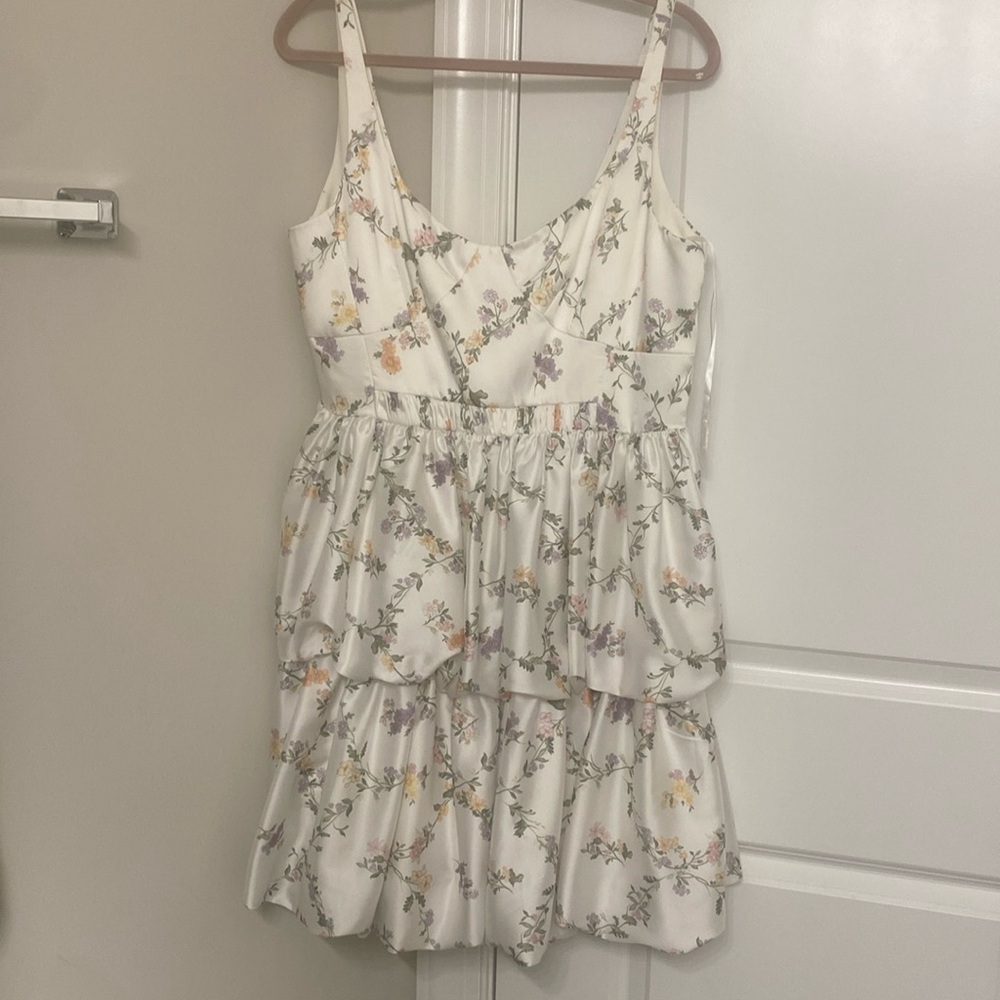 Antonio Melani size 14 dress. White with florals never worn